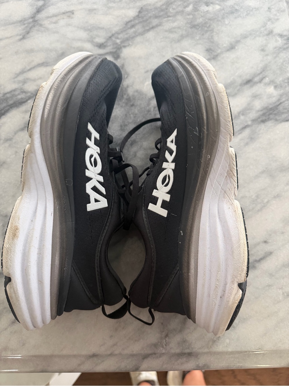 Hoka Women’s Black and White Athletic Running Shoes